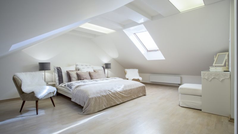 Double bed with a lot of cushions