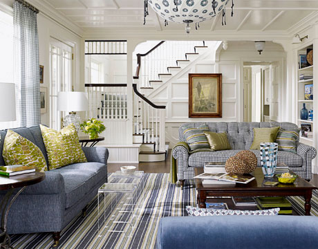 Modern room interior with a wooden staircase