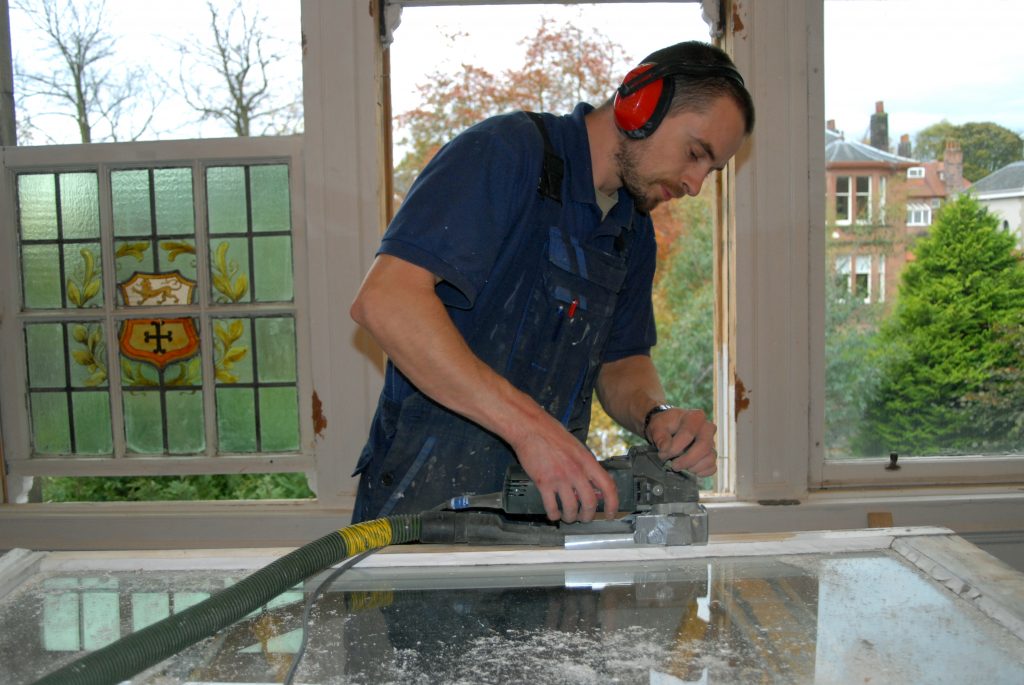 Man Working on Window