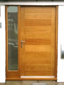 brown wooden door a better option than uPVC when considering wood vs upvc