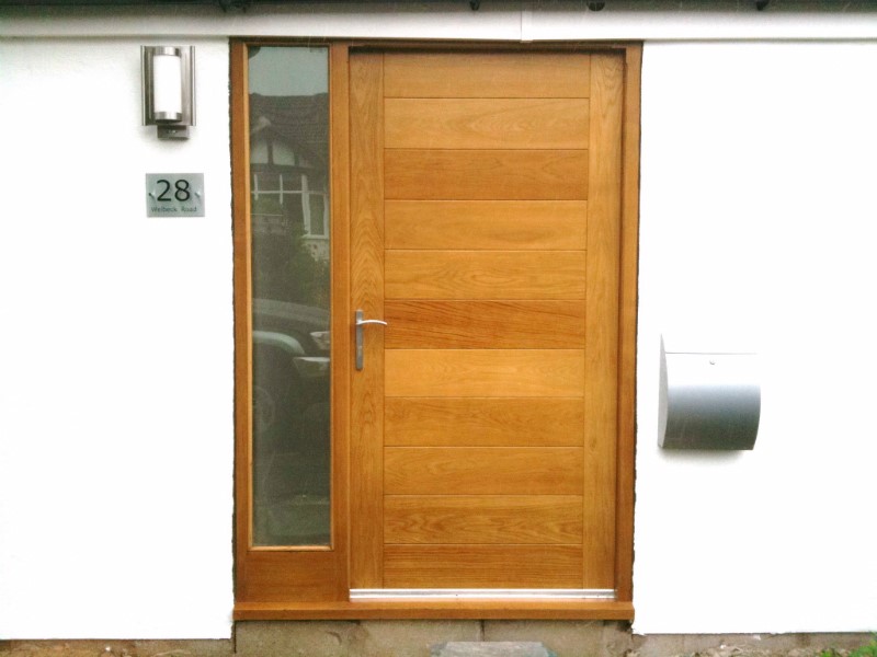 brown wooden door a better option than uPVC when considering wood vs upvc