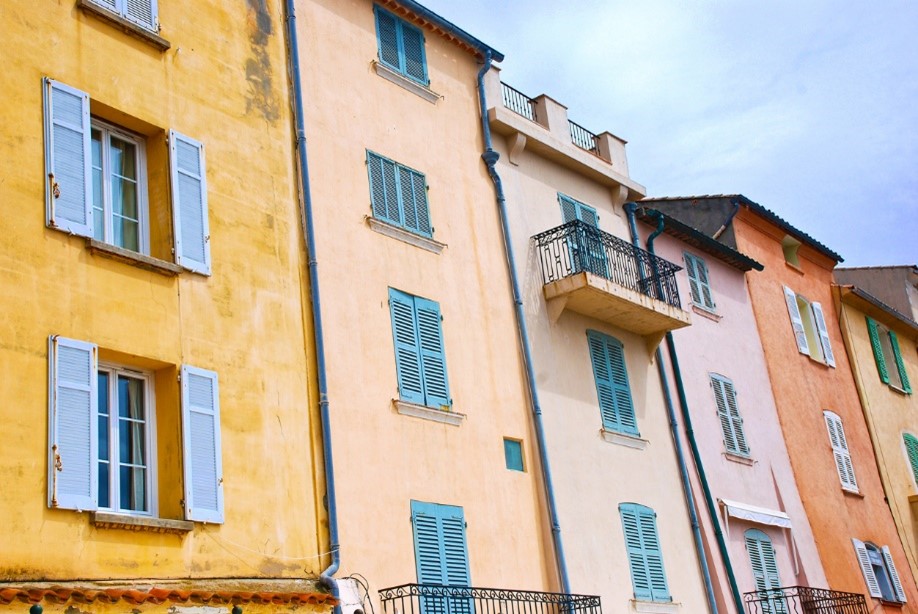 Colourful historical buildings with restored windows