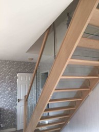 wooden and glass staircase